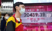 Asia Stocks Mixed After Wall Street Gain, Powell Warns on Rates