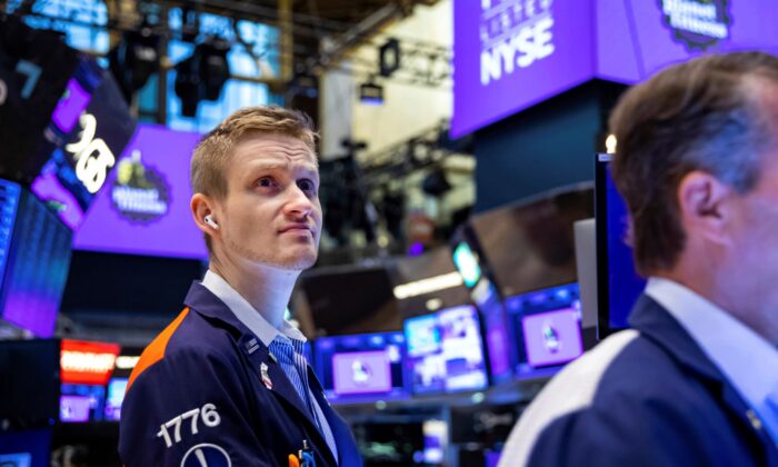 Trader Colby Nelson works on the floor in the New York Stock Exchange on May 17, 2022. (Courtney Crow/New York Stock Exchange via AP)