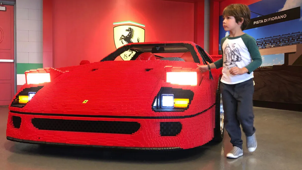 A young Legoland California visitor checks out the Lego Ferrari F40 at the new Lego Ferrari Build and Race attraction. (Brady MacDonald/Orange County Register/TNS)
