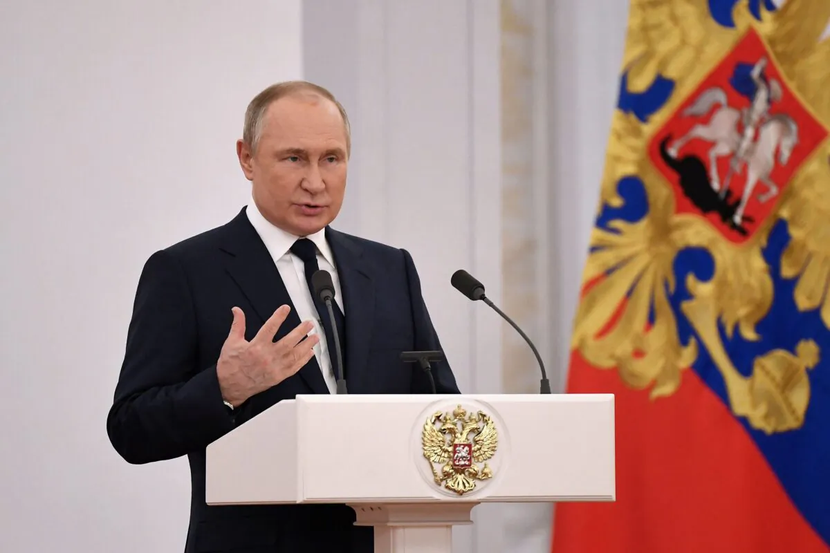Russian President Vladimir Putin gives a speech as he hosts Russia's medal-winning athletes of the Beijing 2022 Winter Olympic Games and members of the country's Paralympic team at the Kremlin in Moscow, on April 26, 2022. (Natalia Kolesnikova/AFP via Getty Images)