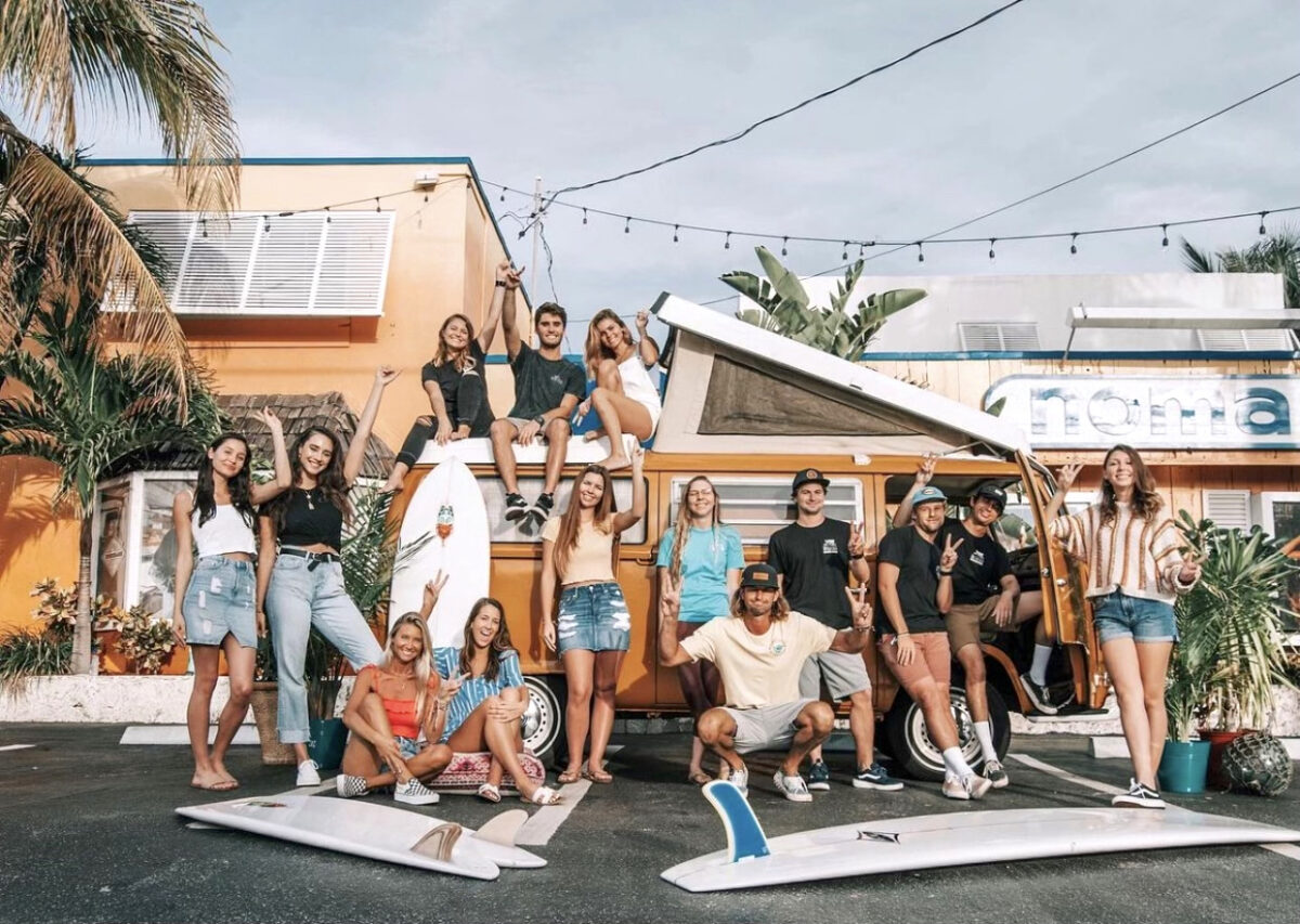 The team at Nomad Surf Shop in Boynton Beach poses for a group photo in front of the store. (Nomad Surf Shop)