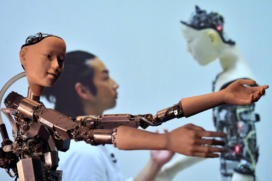 An AI robot with a humanistic face is pictured during a photocall to promote the forthcoming exhibition entitled "AI: More than Human", at the Barbican Centre in London on May 15, 2019. (Ben Stansall/AFP via Getty Images)