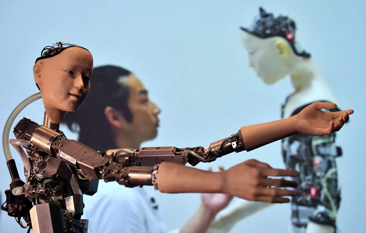 An AI robot with a humanistic face is pictured during a photocall to promote the forthcoming exhibition entitled "AI: More than Human," at the Barbican Centre in London on May 15, 2019. (Ben Stansall/AFP via Getty Images)