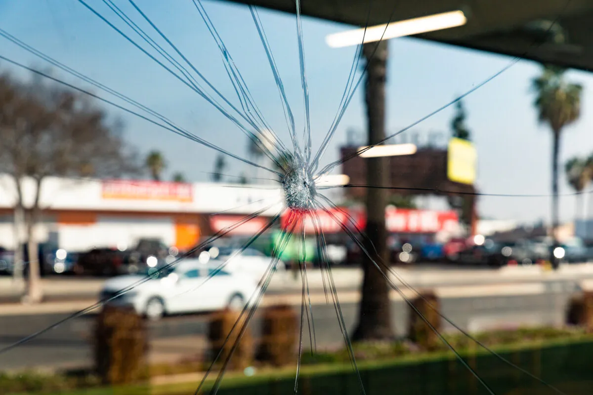 A furniture store was raided by police officers for illegal gambling operations in Anaheim, Calif., on Feb. 11, 2021. (John Fredricks/The Epoch Times)