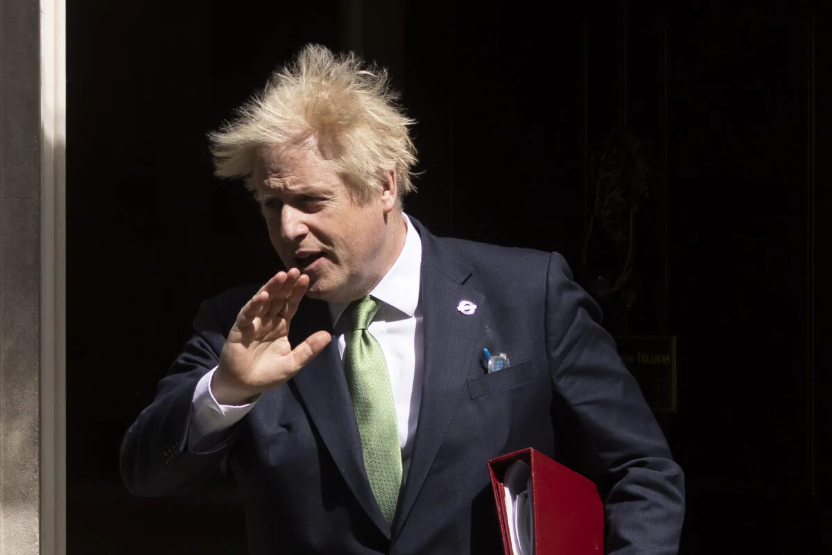 British Prime Minister Boris Johnson leaves 10 Downing Street to attend the weekly Prime Minister’s Questions in the House of Commons, in London, on May 18, 2022. (Dan Kitwood/Getty Images)