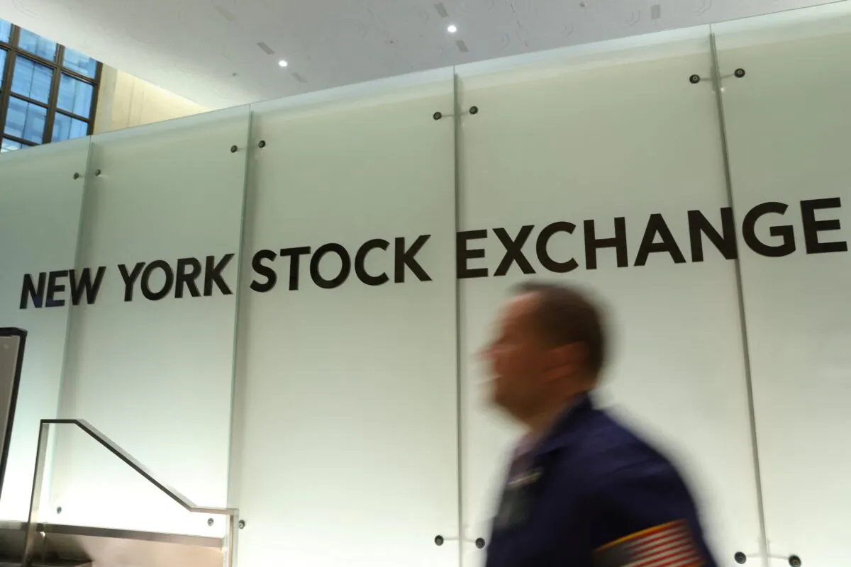 A trader works on the trading floor at the New York Stock Exchange (NYSE) in New York on May 19, 2022. (Andrew Kelly/Reuters)