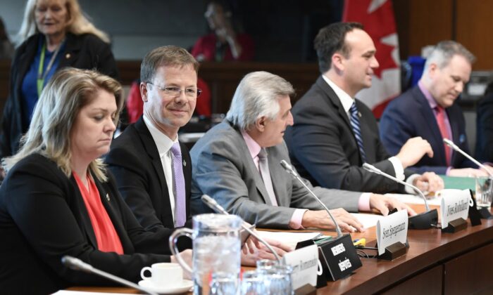 Liberal MPs Sherry Romanad, Sven Spengemann, Yves Robilard, Mark Guerressen and Darren Fisher are waiting for the start of the Defense Standing Committee on the Parliamentary Hill in Ottawa on May 16, 2019.  (Canada Press / Justin Tan)