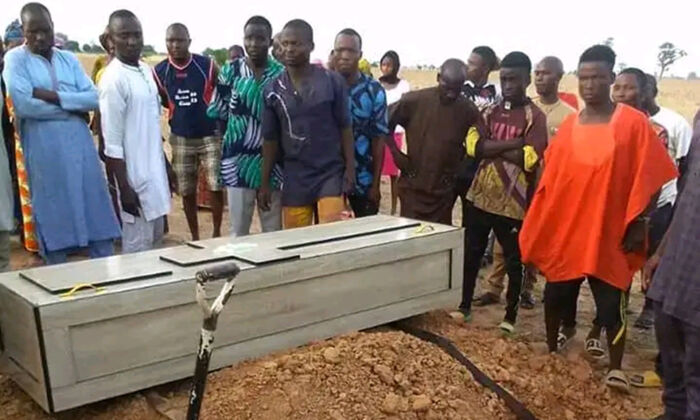 A solemn ceremony for blasphemy lynching victim Deborah Emmanuel near her family home in northeast Niger state on May 14, 2022.  (Courtesy of the Emmanuel family)