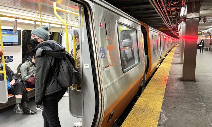 An MBTA Orange Line train stopped in Boston's Chinatown Station on March 8, 2022. (Learner Liu/The Epoch Times)