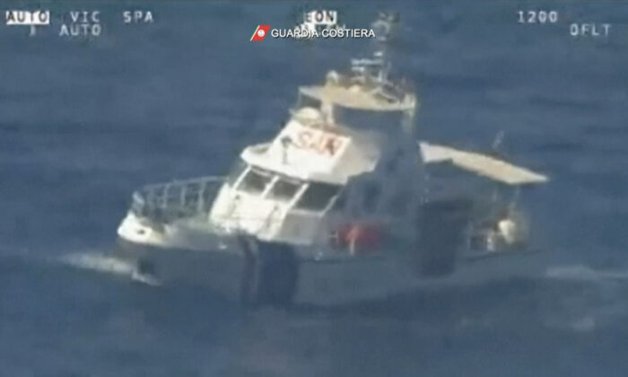 A Croatian Coast Guard vessel at sea during rescue operations on May 19, 2022. (Italian Coast Guard via AP/Screenshot via The Epoch Times)
