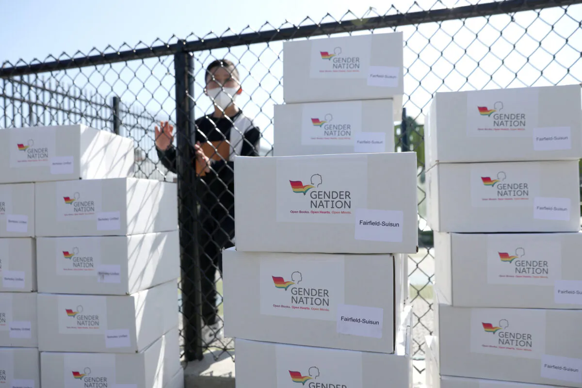 Boxes of donated LGBT books on the playground at Nystrom Elementary School in Richmond, Calif., on May 17, 2022. (Justin Sullivan/Getty Images)