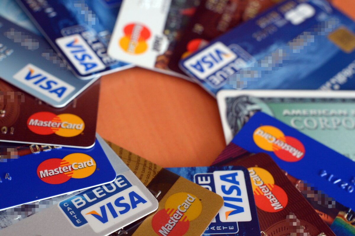 Credit cards falling down are pictured in Rennes, western France on Feb. 5, 2013. (DAMIEN MEYER/AFP via Getty Images)