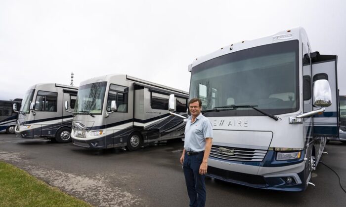 Bucars RV Centre general manager Jeff Redmond with new recreational vehicles on his lot in Balzac, Alta., on May 17, 2022. (The Canadian Press/Todd Korol)