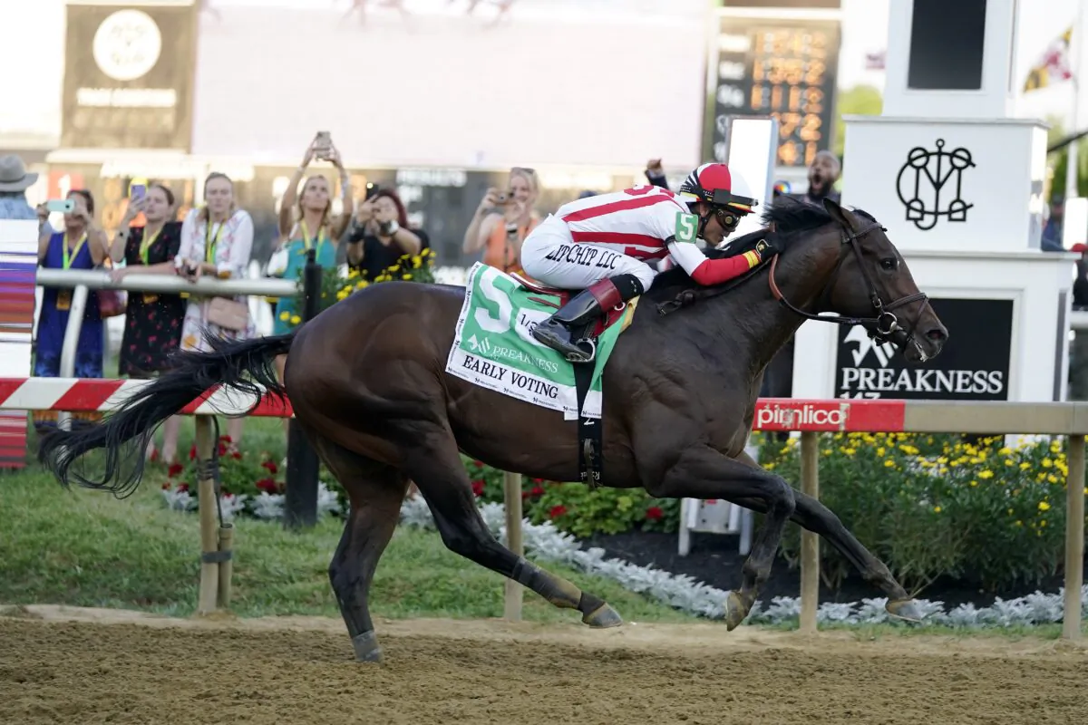 Jose Ortiz atop Early Voting wins the 147th running of the Preakness Stakes horse race at Pimlico Race Course in Baltimore on May 21, 2022. (Julio Cortez/AP Photo)