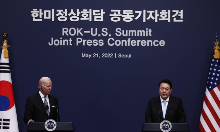 South Korean President Yoon Suk-yeol (R) speaks as U.S. President Joe Biden listens during a news press conference at the Presidential office in Seoul, South Korea, on May 21, 2022. (Jeon Heon-Kyun/Pool/Getty Images)