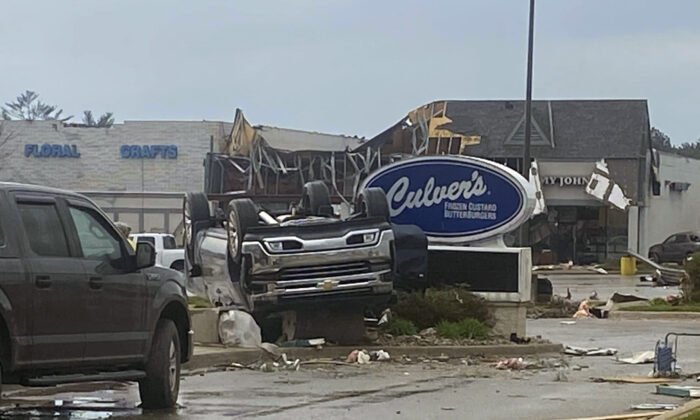 An upended vehicle following an apparent tornado in Gaylord, Mich., on May 20, 2022. (Steven Bischer via AP)