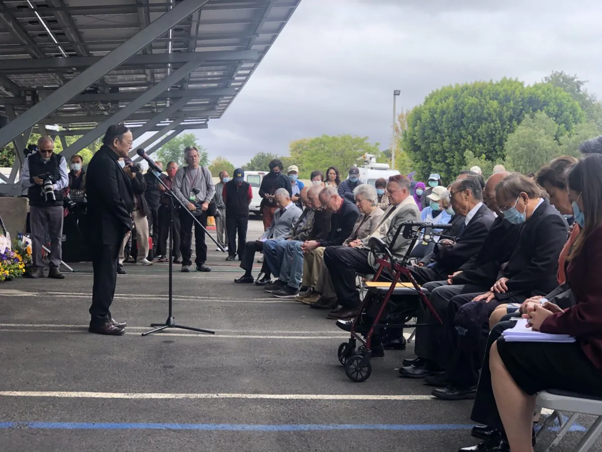 Pastor Albany Lee speaks to members of the Taiwanese community to mourn and honor the victims of a mass shooting at the Presbyterian Church in Laguna Woods, Calif., on May 21, 2022. (Brandon Drey/The Epoch Times)