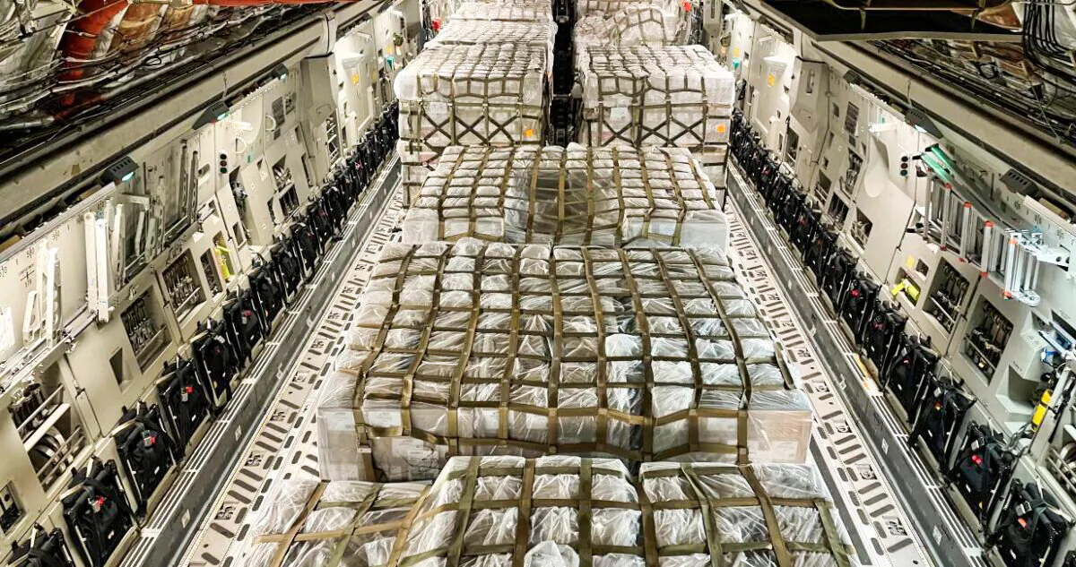 A shipment of baby formula is seen on a U.S. military C-17 at an airport in Indianapolis, Indiana, on May 22, 2022. (White House Twitter feed/Screenshot via The Epoch Times)
