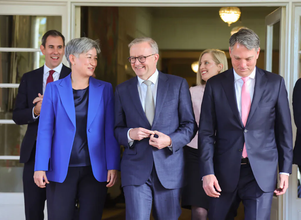 Anthony Albanese (C), Penny Wong (L) and Richard Marles (R) walk out of Government House after being sworn in as prime minister, foreign minister, and deputy prime minister respectively, in front of the Governor-General, His Excellency General the Honourable David Hurley AC DSC (Retd) in Canberra, Australia, on May 23, 2022. (David Gray/Getty Images)