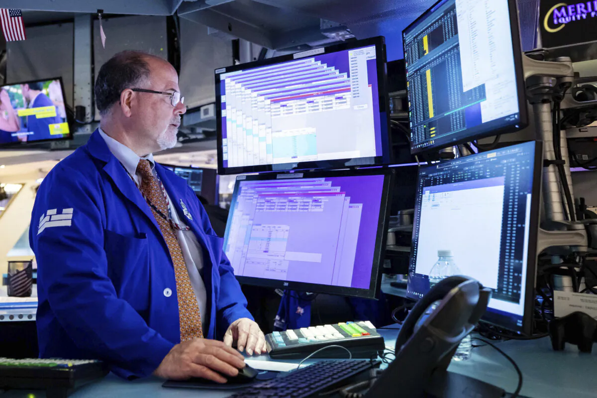 Specialist Douglas Johnson works on the New York Stock Exchange's trading floor on May 23, 2022. (David L. Nemec/New York Stock Exchange via AP)