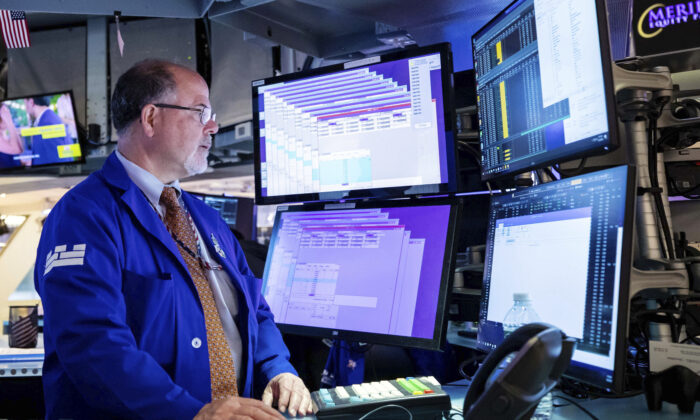 Specialist Douglas Johnson works on the New York Stock Exchange's trading floor on May 23, 2022. (David L. Nemec/New York Stock Exchange via AP)