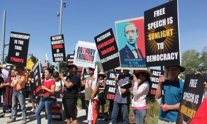 Protesters denounce Meta CEO Mark Zuckerberg at a May 2022 Humanity Against Censorship rally in front of Meta headquarters in Menlo Park, Calif. (Mrs. Hao/The Epoch Times)