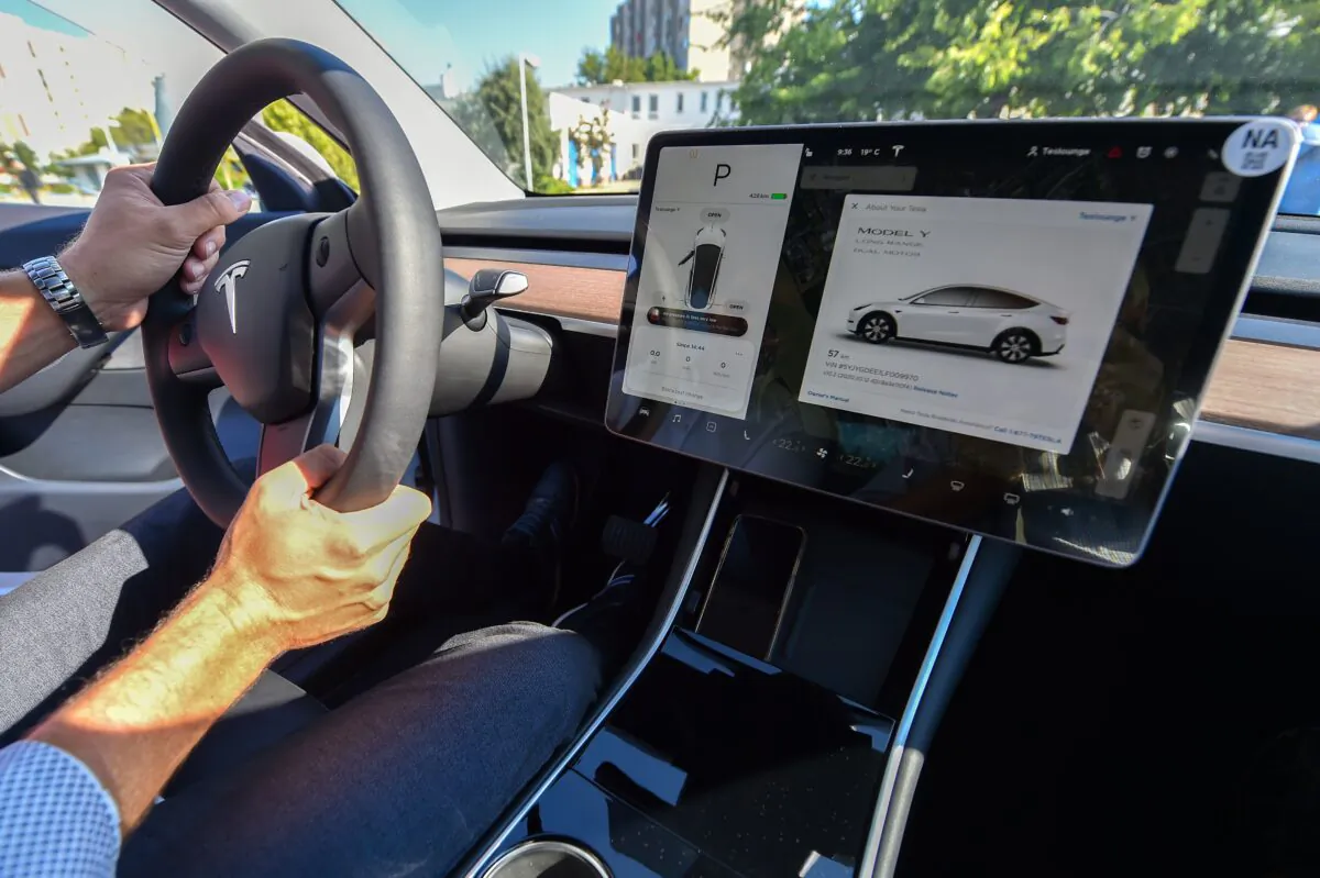 The inside view of a "Tesla Model Y" car, an all-electric compact SUV by U.S. electric car giant Tesla, during its presentation at the Automobile Club in Budapest on Sept. 5, 2020. (Attila Kisbenedek/AFP via Getty Images)