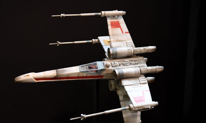 A Star Wars movie X-Wing fighter model, valued between $40,000 to $60,000, at the Paley Center for Media in Calabasas, Calif., on Dec. 6, 2018. (Mark Ralston/AFP via Getty Images)