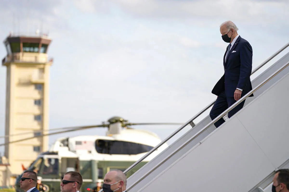 U.S. President Joe Biden disembarks from Air Force One on his arrival at Yokota Air Base, in Fussa, on the outskirt of Tokyo on May 22, 2022. (Evan Vucci/AP Photo)