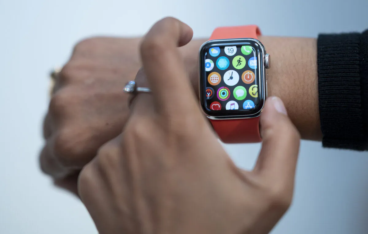 An employee demonstrate the new Apple watch inside the newly renovated Apple Store at Fifth Avenue in New York, on Sept. 19, 2019. (Johannes Eisele/AFP via Getty Images)