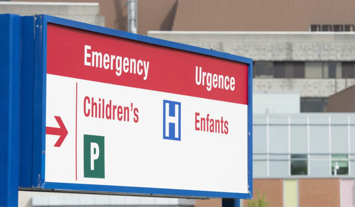 A sign directing visitors to the emergency department is shown in this file photo on May 15, 2015. (Adrian Wyld/The Canadian Press)
