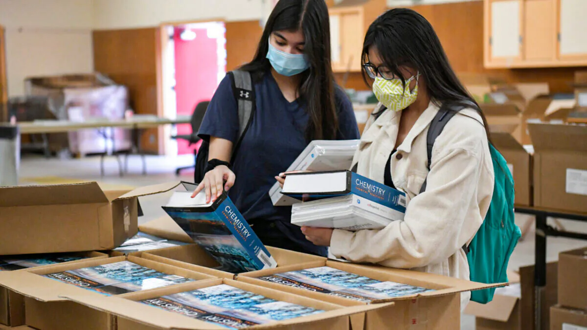 Students pick up their school books at Hollywood High School in Hollywood, Calif., on Aug. 13, 2020. (Rodin Eckenroth/Getty Images)