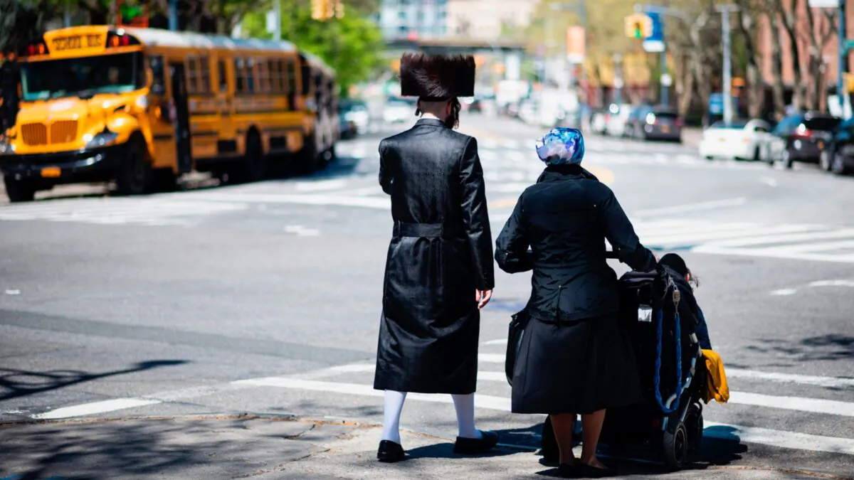 A Jewish family crosses a street in a Jewish quarter in Williamsburg Brooklyn in New York City on April 24, 2019. (Johannes Eisele/AFP via Getty Images)