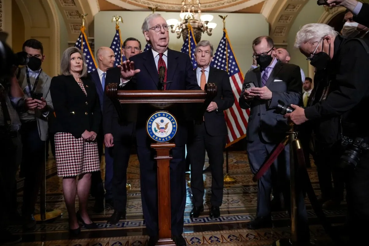 Senate Minority Leader Mitch McConnell (R-Ky.) speaks to reporters after a closed-door lunch meeting with Senate Republicans at the U.S. Capitol on May 24, 2022. (Drew Angerer/Getty Images)