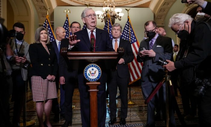 Senate Minority Leader Mitch McConnell (R-Ky.) speaks to reporters after a closed-door lunch meeting with Senate Republicans at the U.S. Capitol on May 24, 2022. (Drew Angerer/Getty Images)