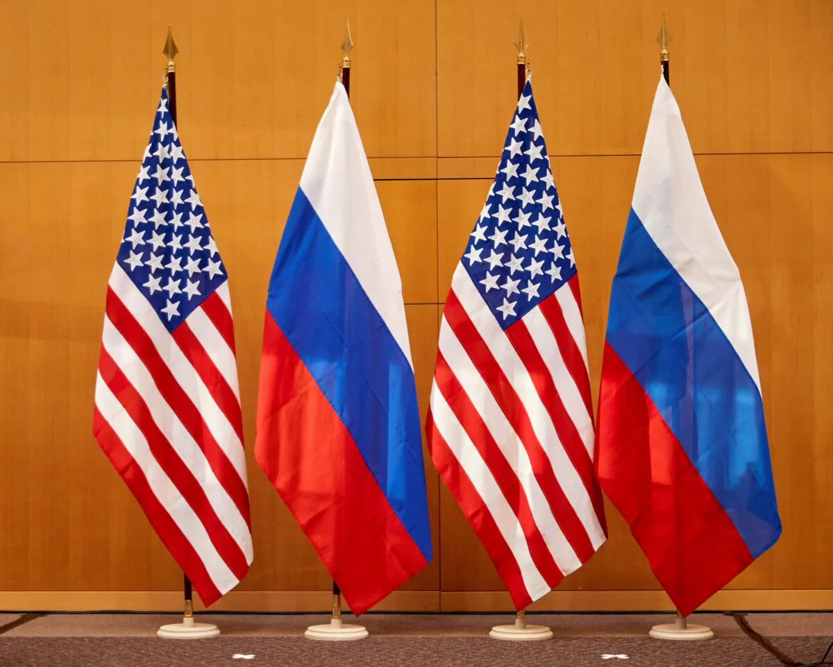 Russian and U.S. flags before talks between Russian Deputy Foreign Minister Sergei Ryabkov and U.S. Deputy Secretary of State Wendy Sherman at the U.S. Mission in Geneva, Switzerland, on Jan. 10, 2022. (Denis Balibouse/Reuters)