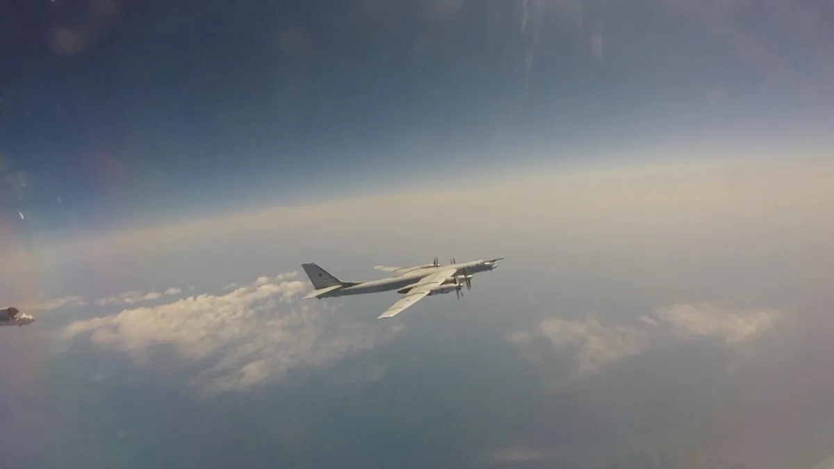 A Russian Tu-95 strategic bomber flies during Russian-Chinese military aerial exercises to patrol the Asia-Pacific region, at an unidentified location, in this still image taken from a video released on May 24, 2022. (Russian Defense Ministry/Handout via Reuters)