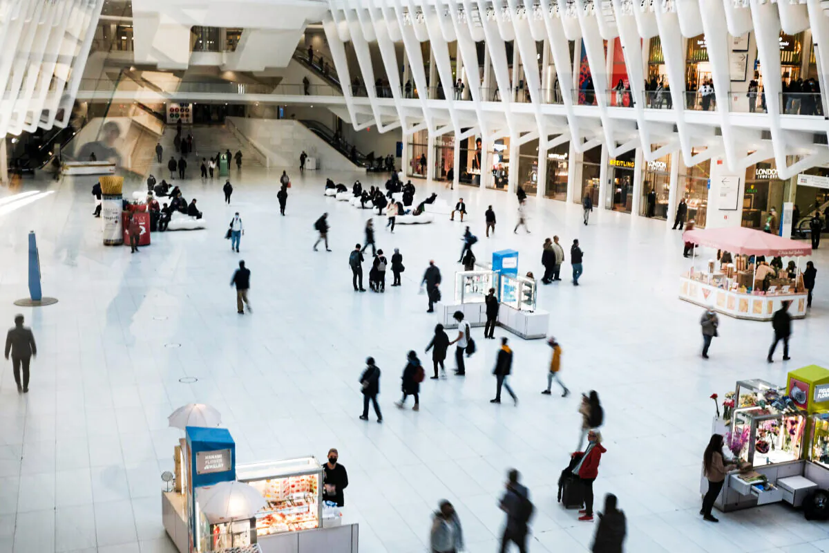 People walk through a mall in Manhattan in New York City on April 4, 2022. A recent report from the Commerce Department shows a 1.4 percent drop in the U.S. GDP for the first quarter of the year. (Spencer Platt/Getty Images)