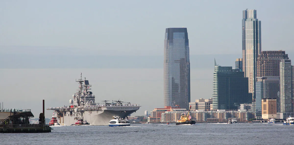 USS Bataan leads the Fleet Week vessel parade up the Hudson River. The Wasp-class amphibious assault ship is docked at Pier 88 and will be open to the public during Fleet Week. (Richard Moore/The Epoch Times)