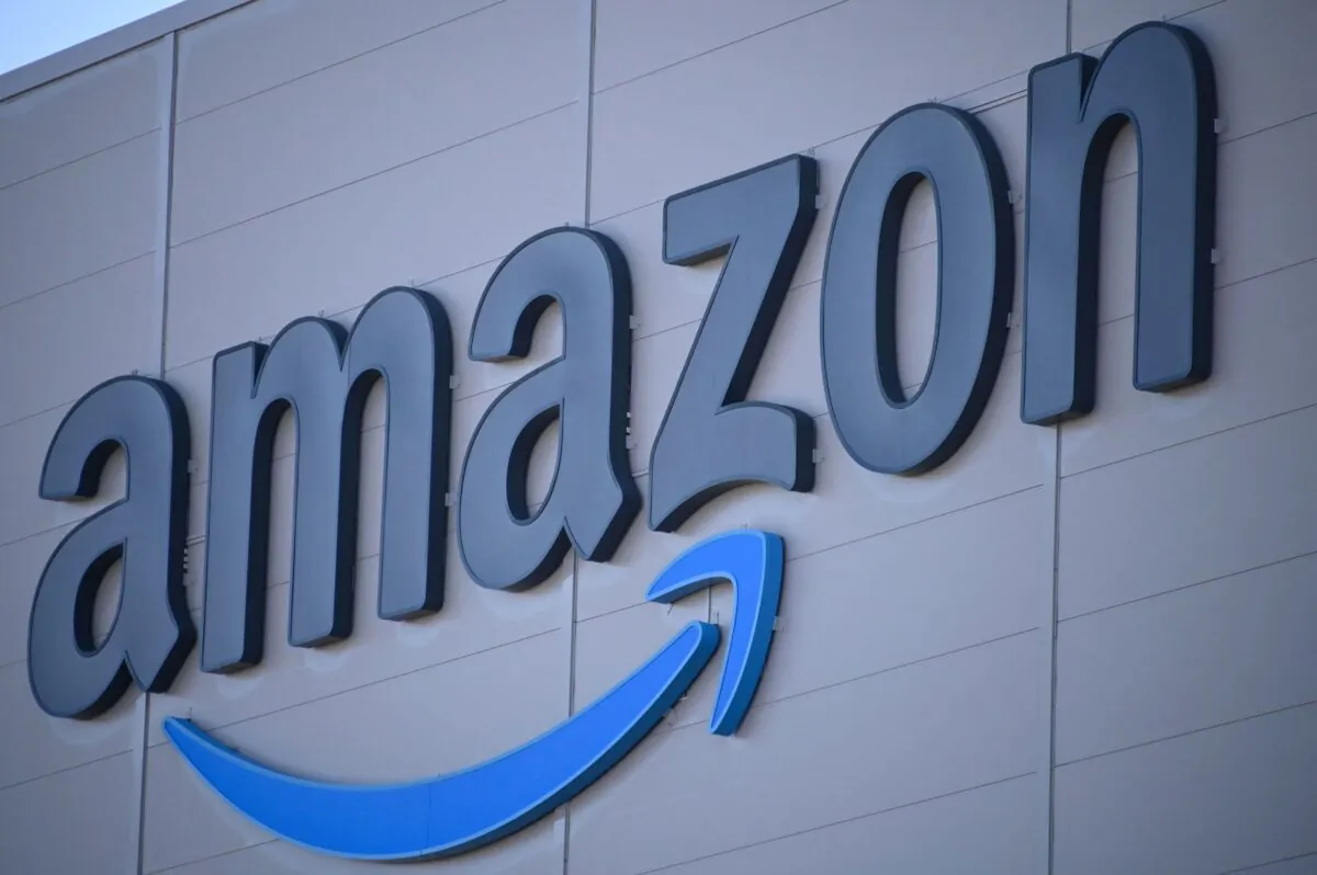 The Amazon logo on the opening day of a new distribution center near Metz, France, on Sept. 23, 2021. (Sebastien Bozon/AFP via Getty Images)