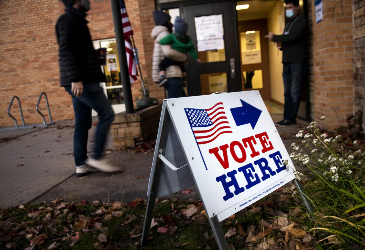 File photo: Voters arrive at Bryn Mawr Community School on Election Day on November 2, 2021 in Minneapolis, Minnesota. (Stephen Maturen/Getty Images)