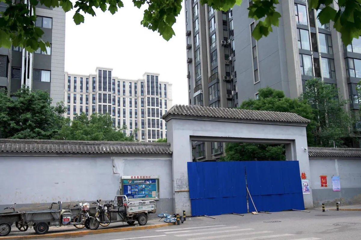 A barricaded entrance to a residential area is seen under lockdown due to COVID-19 restrictions in Beijing, China, on May 24, 2022. (Noel Celis/AFP via Getty Images)