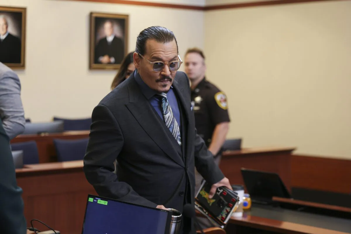 Actor Johnny Depp arrives at the Fairfax County Circuit Courthouse in Fairfax, Va., on May 25, 2022. (Evelyn Hockstein/Pool photo via AP)