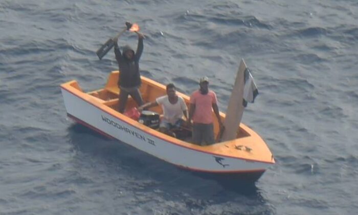 Three men found on board the Woodhaven III near Makin Island, Kiribati, on May 23, 2022. (New Zealand Defence Force)