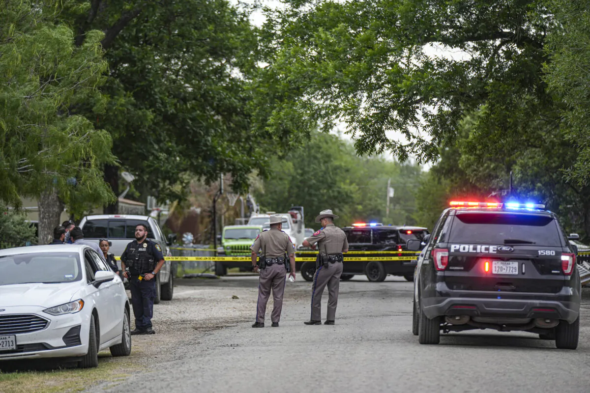 Police cordon off the scene where a woman was fatally shot prior to an elementary school shooting, in Uvalde, Texas, on May 24, 2022. (Charlotte Cuthbertson/The Epoch Times)