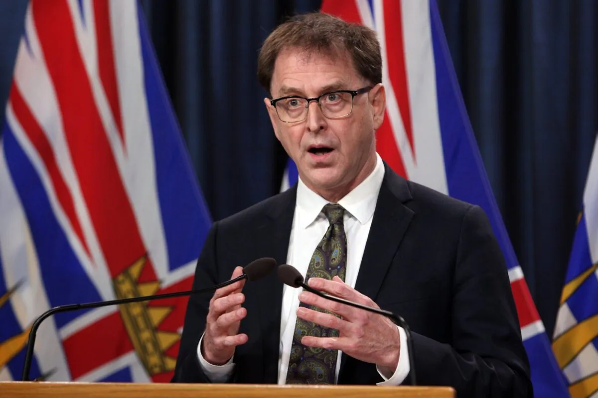 British Columbia Health Minister Adrian Dix speaks at a press conference in Victoria on Dec. 21, 2021. (The Canadian Press/Chad Hipolito)