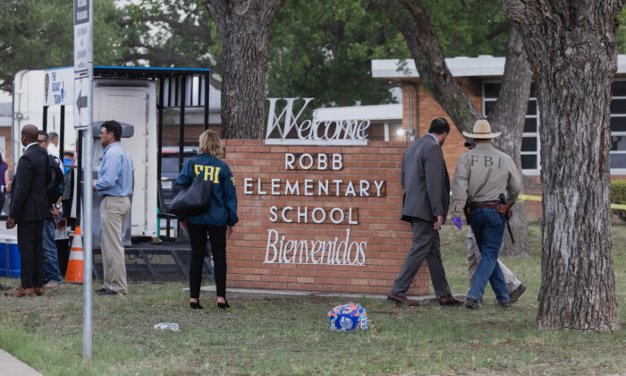 Law enforcement work the scene after a mass shooting at Robb Elementary School in Uvalde, Texas, on May 24, 2022. (Jordan Vonderhaar/Getty Images)
