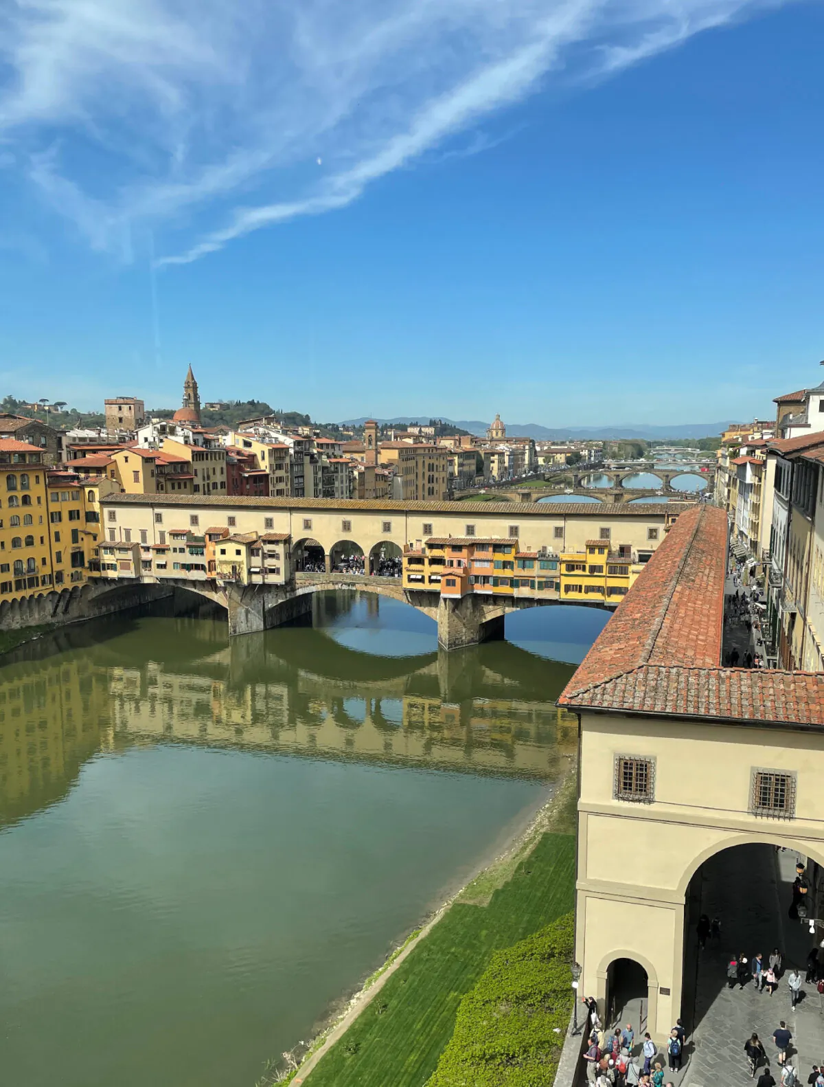 An elevated passageway, Corridoio Vasariano, connecting the duke's Palazzo Pitti with Palazzo Vecchio, is visible as it crosses the Ponte Vecchio in Florence, Italy. (Photo courtesy of Lesley Sauls Frederikson.)
