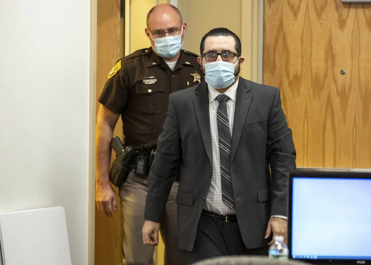 Armando Barron enters a courtroom at the Cheshire County Superior Court in Keene, N.H., on May 26, 2022. (Hannah Schroeder/The Sentinel via AP, Pool)
