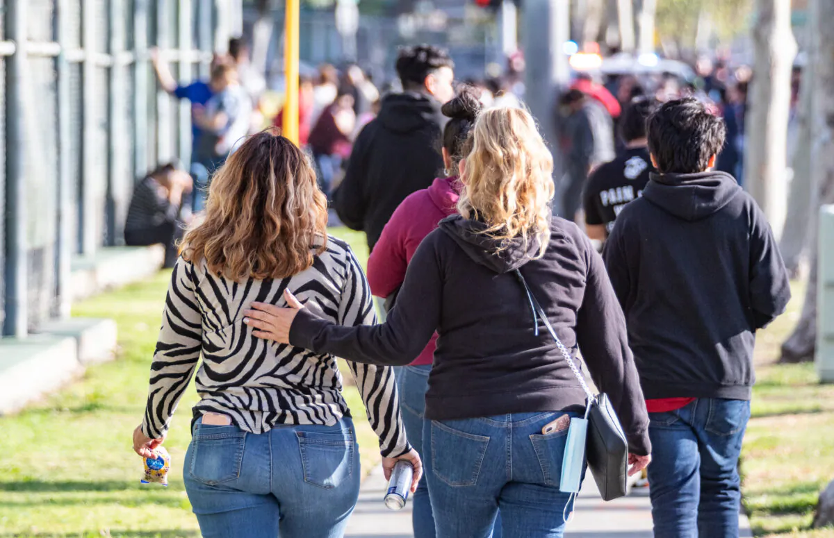 Parents and students walk at Santa Ana High School in Santa Ana, Calif., on March 10, 2022. (John Fredricks/The Epoch Times)